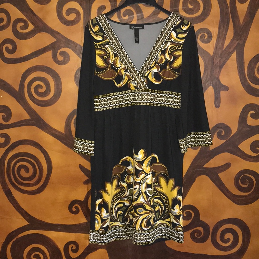 Fun black dress. Beaded, soft, tribal design